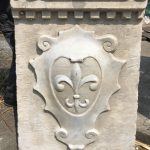 Italian Carrera Marble Fleur de Lis coat of arms, antiqued 26" Ht Hand sculpted by famed artisan Emiliano