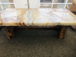 Onyx table in ochre and cream, 5' length, wooden legs