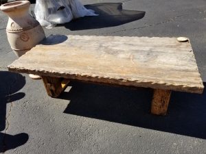 Travertine coffee table with hammered edge, wood base shown here, also available with wrought iron base